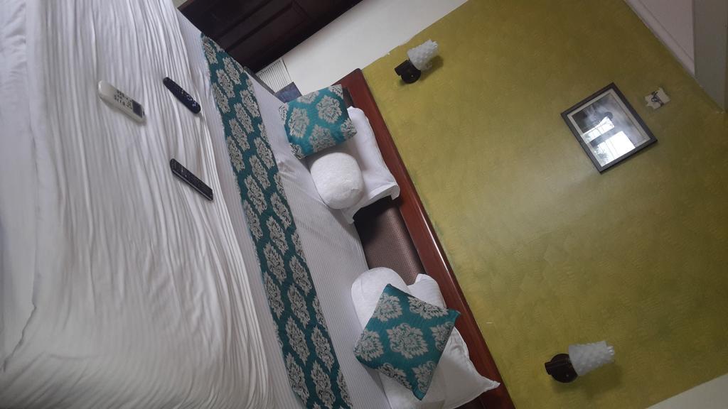 Hotel Peace Park Panvel Esterno foto